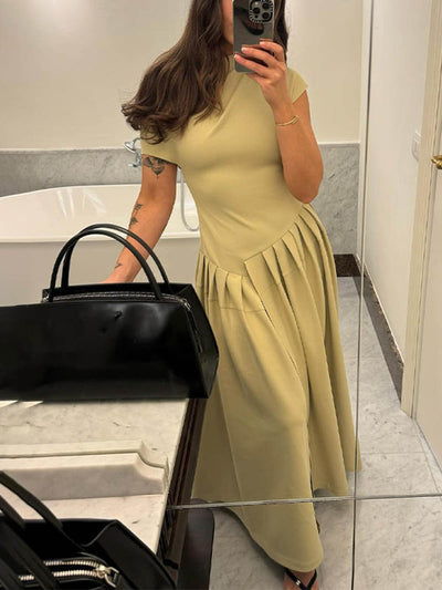 Abito maxi elegante con scollo inclinato, vestibilità slim, orlo ampio