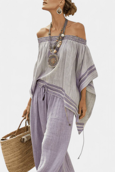 Completo in lino di bambù a righe, con spalle scoperte e pantaloni larghi per uno stile elegante e fresco