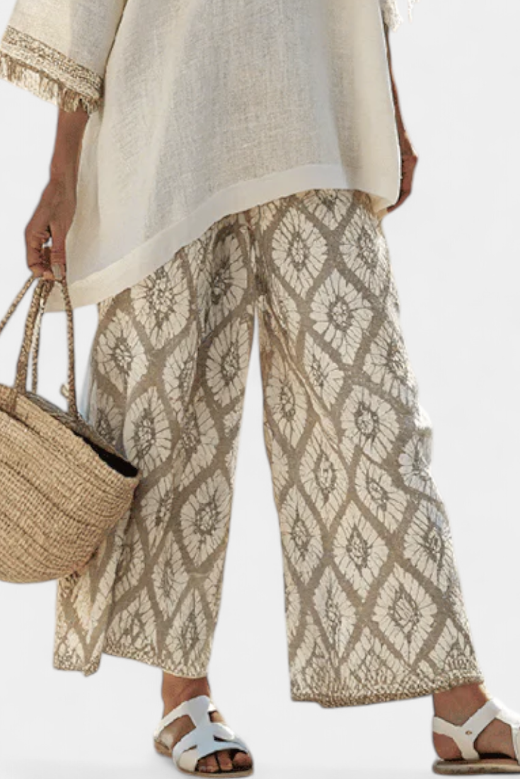 Completo Boho Chic Daisy: Camicia Larga e Pantaloni Stampati per uno Stile Unico