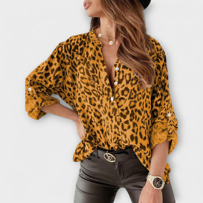 Blusa alla moda con stampa leopardata