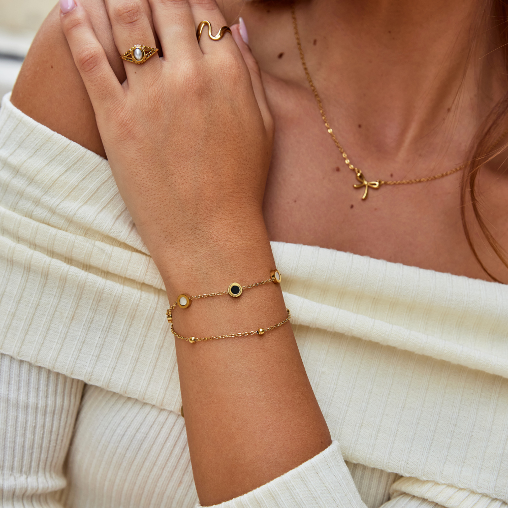 Bracciale in pietra bianca e nera | Oro