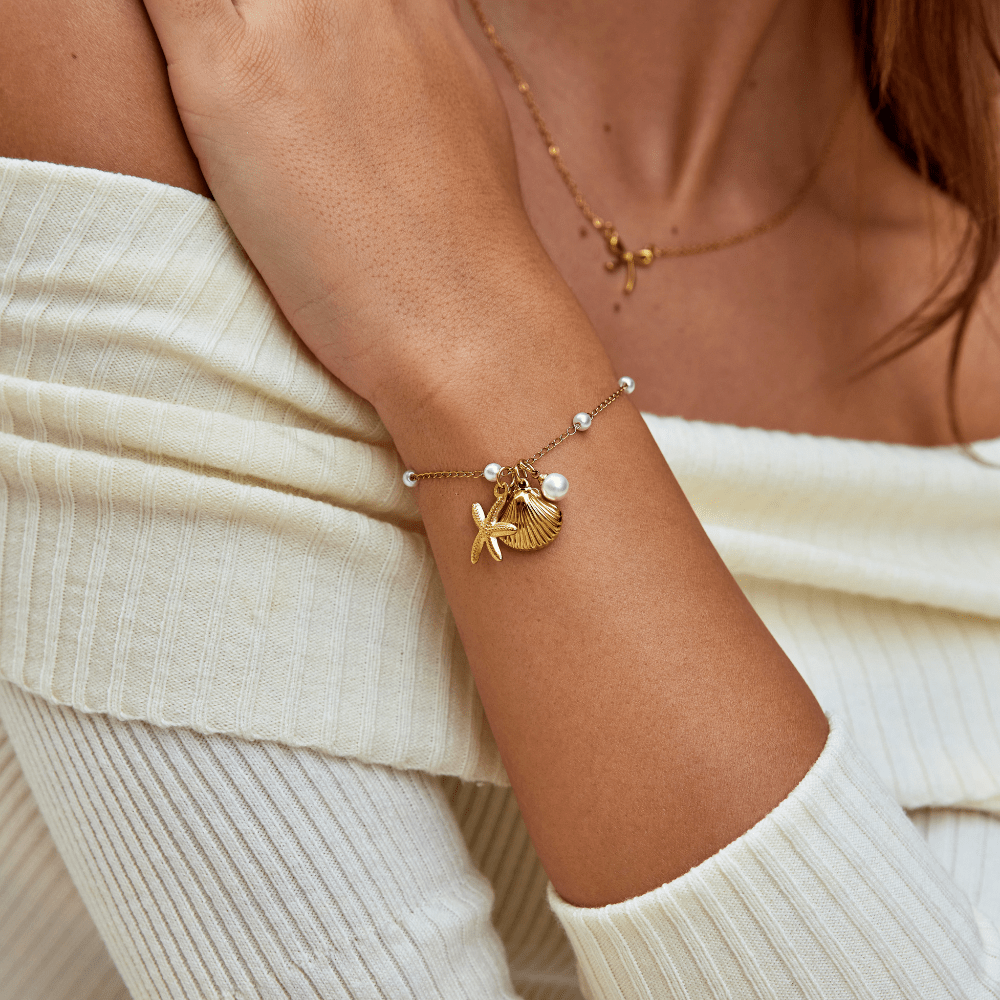 Bracciale con ciondoli a forma di conchiglia
