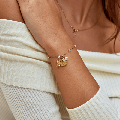 Bracciale con ciondoli a forma di conchiglia