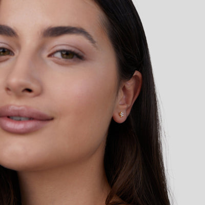 Orecchini con perle e fiori sbocciati