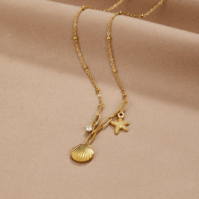 Collana con conchiglia dorata e stella marina