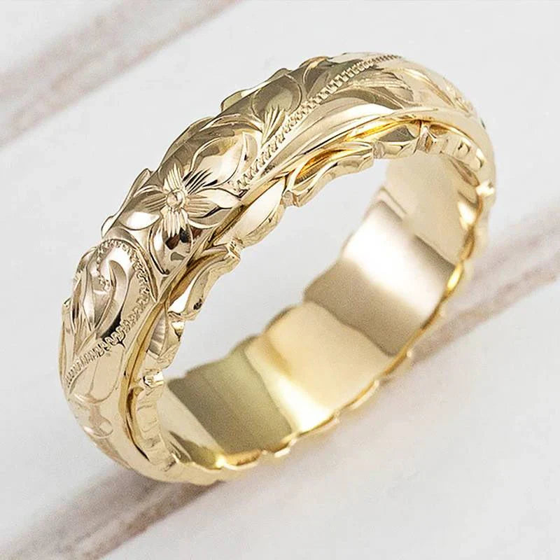 Anello antico con fiore in oro | Oro