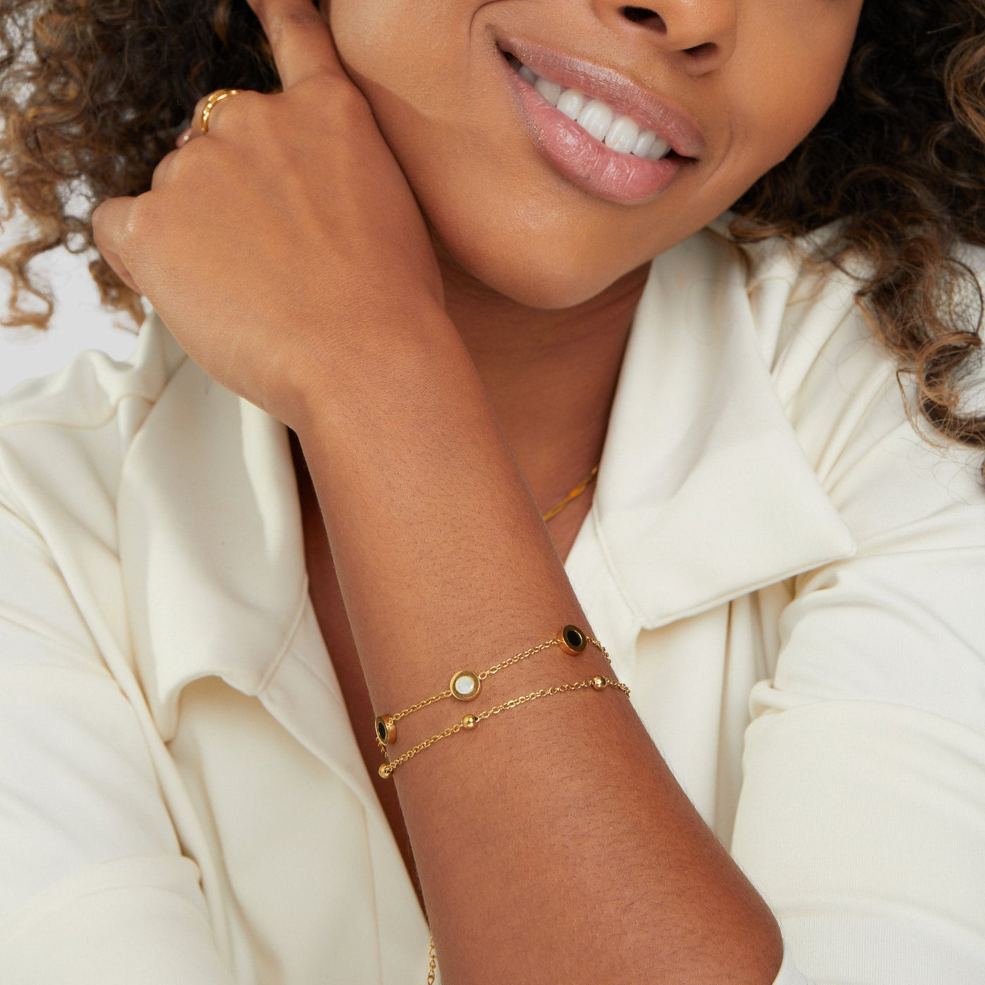 Bracciale in pietra bianca e nera | Oro